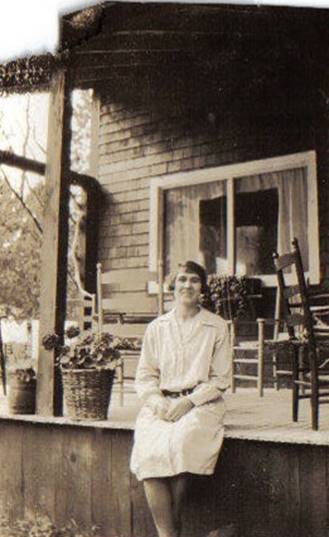 A couple of women posing for a picture

Description automatically generated